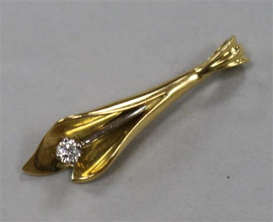 An 18ct gold and diamond set Lily of the Valley pendant, overall 28mm.